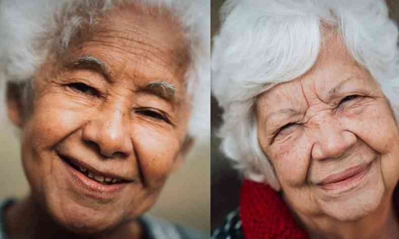 duas mulheres idosas na casa dos 80 anos sorriem no ensaio
