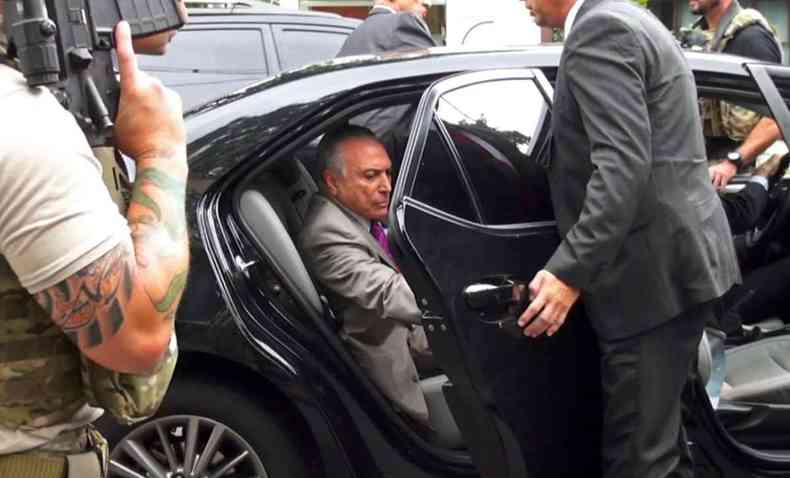 Ex-presidente Michel Temer teve seu pedido de soltura aceito por Ivan Athi(foto: AFP/Band TV)