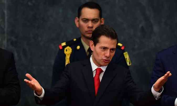 O presidente mexicano, Enrique Pea Nieto, lamentou e reprovou a construo do polmico muro fronteirio(foto: AFP / Ronaldo SCHEMIDT )