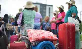 Mulheres camponesas viajam mais de 40 horas de nibus para a Marcha das Margaridas, em Braslia. Elas buscam mais representatividade e melhores condies de trabalho e de vida no campo (Marcello Casal Jr/Agncia Brasil(foto: Marcello Casal Jr/Agncia Brasil)