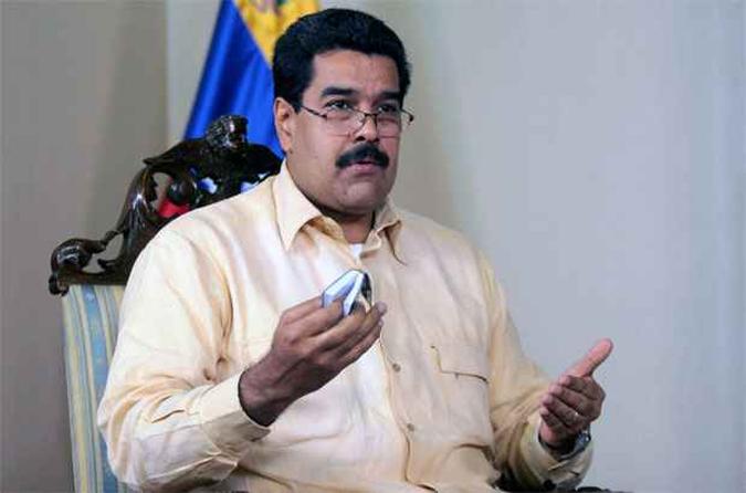 O vice Nicols Maduro afirmou que Chvez  um presidente reeleito e continuar em suas funes(foto: AFP PHOTO/PRESIDENCIA )