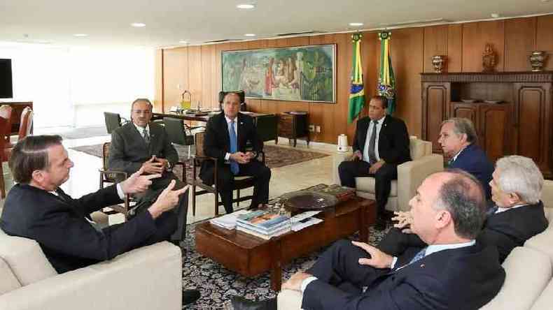Chico Rodrigues (do lado esquerdo de Bolsonaro) participava de reuniões com o presidente, como essa em 14 de março de 2019(foto: Presidência da República)