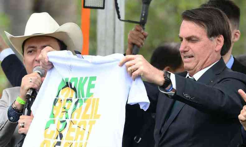 'Se no for (digital), vai demorar alguns meses, longos meses', disse Bolsonaro(foto: Evaristo S/AFP)