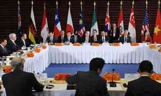 Foto tirada em 2014 mostra os lderes mundiais reunidos para discutir o acordo comercial(foto: MANDEL NGAN/AFP)