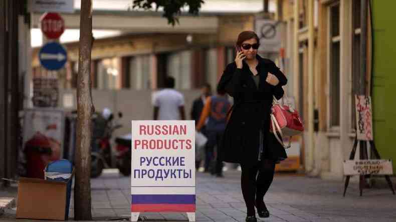 A street in Nicosia, Cyprus, with a sign indicating the sale of Russian products
