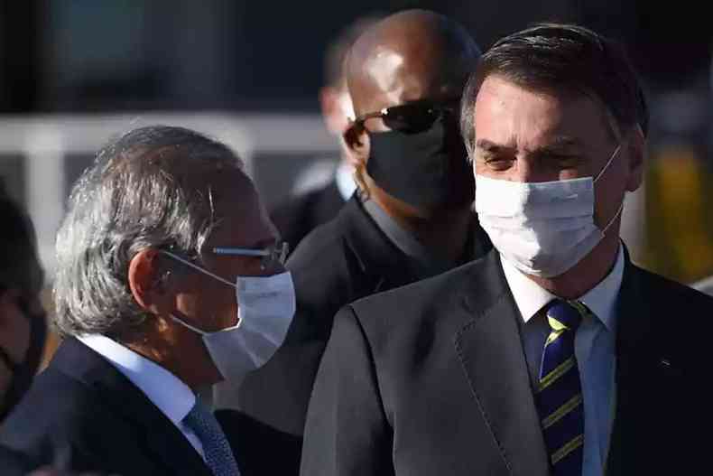 Ministro da Economia, Paulo Guedes, ao lado do presidente Jair Bolsonaro(foto: AFP / EVARISTO SA)