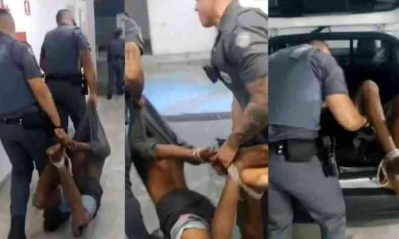Policiais carregam homem negro amarrado pelas mãos e pés após ele ser retirado de uma viatura