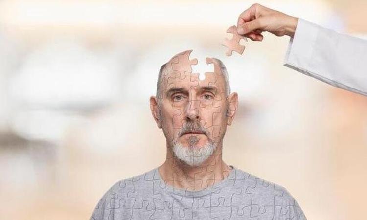 homem em formato de quebra cabe�as com uma pe�a desencaixada na cabe�a