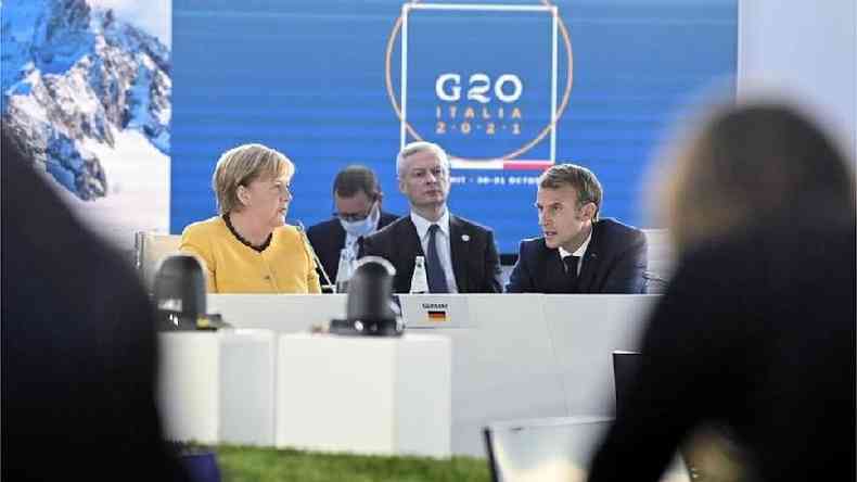 Angela Merkel e Emmanuel Macron em plenria do G20