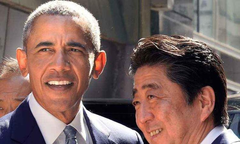 O ex-presidente dos EUA, Barack Obama,  recebido pelo primeiro-ministro do Japo, Shinzo Abe(foto: SHIZUO KAMBAYASHI/AFP )