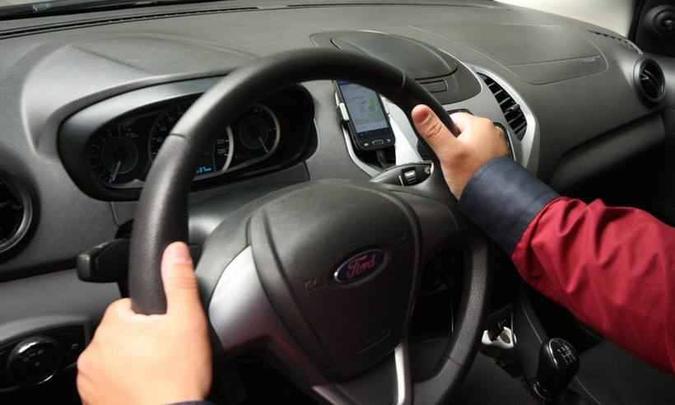 Se sancionada lei, motoristas de aplicativos terão que ser residentes em Confins (foto: Edésio Ferreira/EM/D.A PRESS) Se sancionada lei, motoristas de aplicativos terão que ser residentes em Confins (foto: Edésio Ferreira/EM/D.A PRESS)