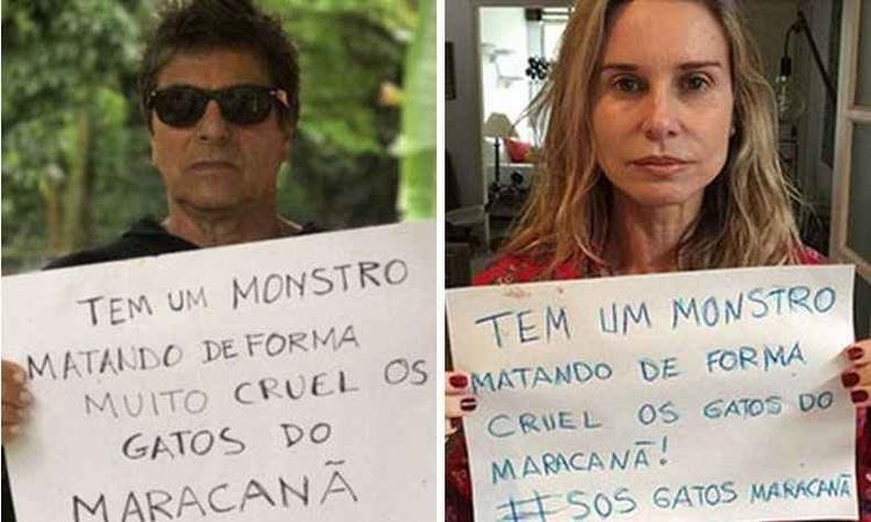 O ator Evandro Mesquita e a atriz Paula Bulamarqui seguram cartazes com a frase 
