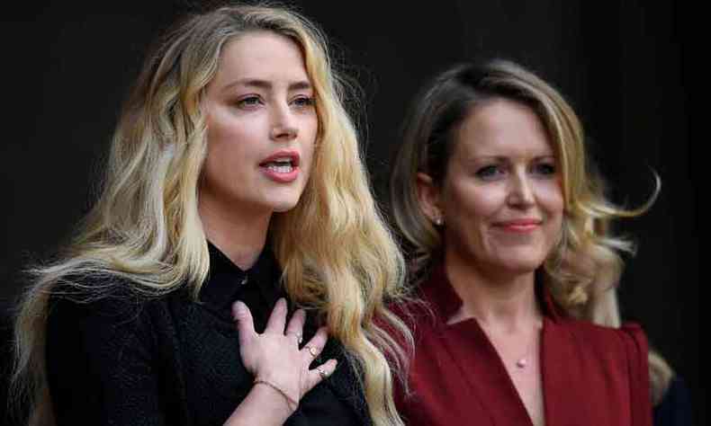 Amber Heard (E) deps na Alta Corte de Londres, dizendo-se vtima de 'violncia fsica e psicolgica'
