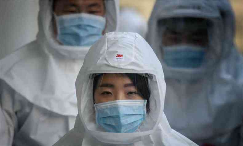 O boletim revela ainda que apenas 7.263 pacientes permanecem internados na China(foto: Ed JONES / AFP )