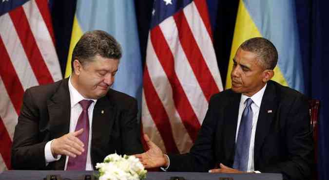 Presidente ucraniano Petro Poroshenko se encontra com Barack Obama, que promete apoio poltico, financeiro e militar(foto: Kevin Lamarque/Reuters)