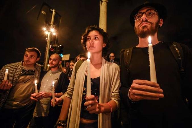 Homenagens foram feitas neste domingo em v�rias pa�ses (foto: AFP / ANDREAS SOLARO)
