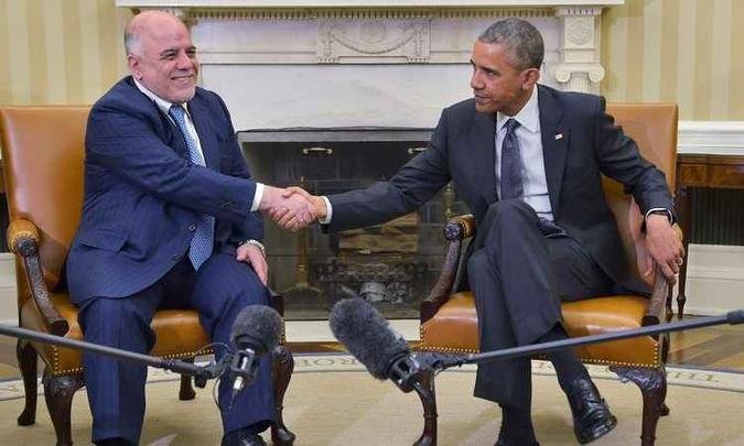 Obama fez o compromisso financeiro durante uma reuni�o com o primeiro-ministro iraquiano, Haider al-Abadi(foto: AFP PHOTO/MANDEL NGAN )