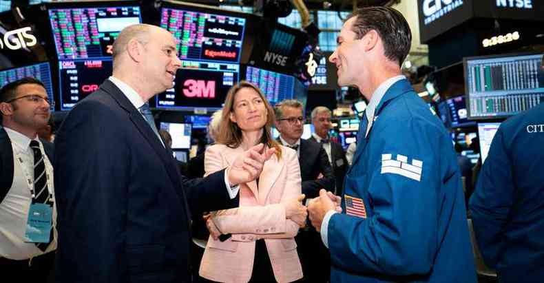 Executivos na Bolsa de Nova York: em um ambiente por dcadas dominado pela presena masculina, as mulheres j conquistaram seu espao (foto: Courtney Crow/AFP)