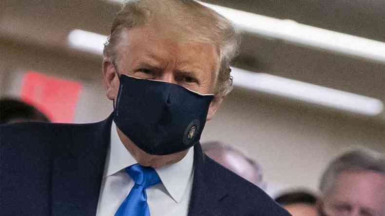 Trump cedeu  forte presso para dar um exemplo de sade pblica enquanto a pandemia do novo coronavrus avana nos Estados Unidos(foto: ALEX EDELMAN / AFP)