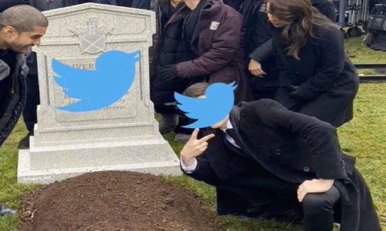 Imagem mostra um homem, vestido de preto, ajoelhado em frente a um tmulo. Ele faz o smbolo da paz e amor com os dedos. O pssaro azul, smbolo do Twitter, aparece cobrindo o rosto do homem e tambm a lpide.