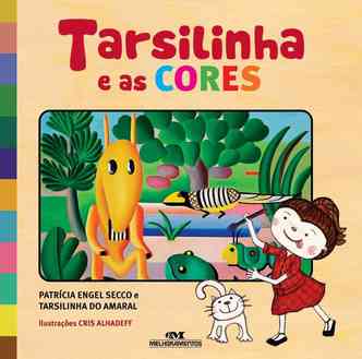 Menina e gatinho brincam com imagens criadas por Tarsila do Amaral na capa do livro Tarsilinha e as cores