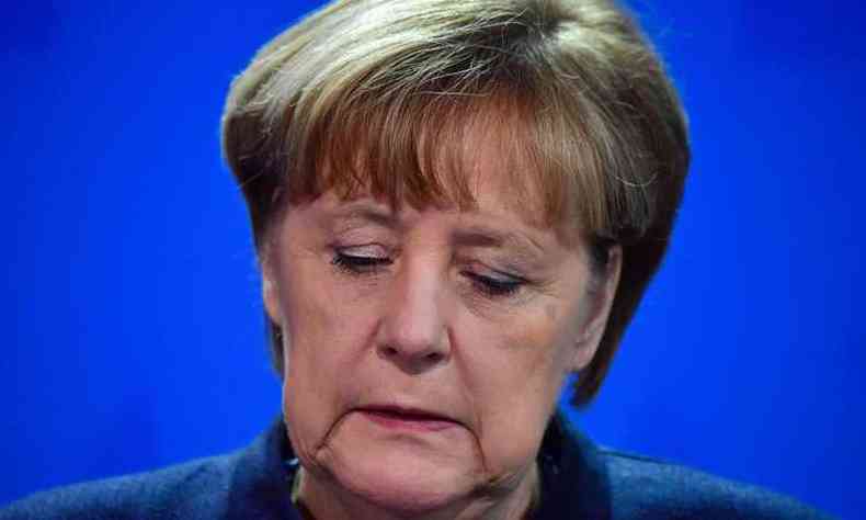 A chanceler alem, Angela Merkel, fala durante uma conferncia de imprensa nesta tera-feira em Berlim, aps um ataque terrorista que matou 12 pessoas (foto: AFP / John MACDOUGALL )