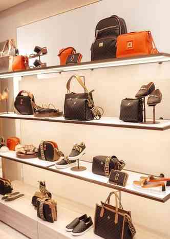 Bags and shoes on the shelves at Luz da Lua