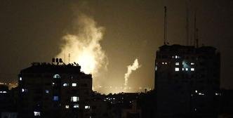 A cidade de Gaza no in�cio da noite ap�s investida israelense(foto: AFP)