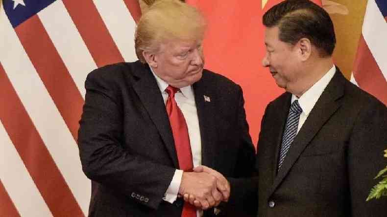 Donald Trump, retratado aqui ao lado do presidente Xi Jinping, apresenta a China como uma ameaa aos EUA(foto: Getty Images)