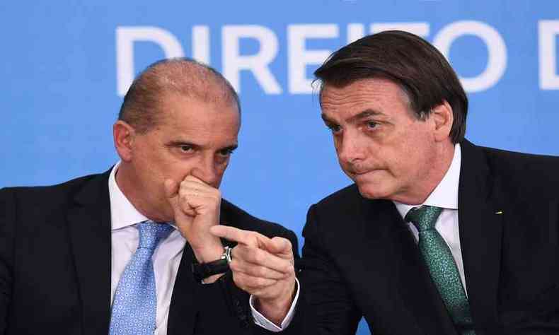 O ministro Onyx Lorenzoni e o presidente Jair Bolsonaro, durante evento em Braslia(foto: AFP / EVARISTO SA - 27/08/2019)