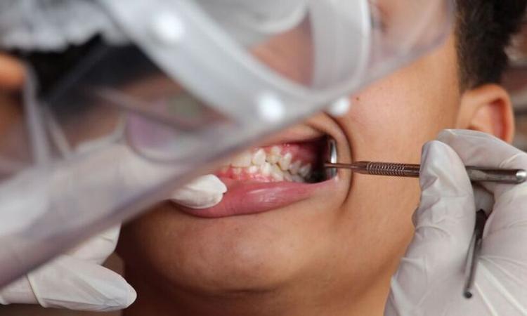 Criana no dentista