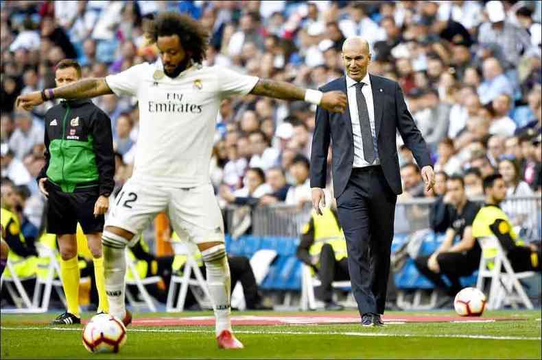 O brasileiro Marcelo no jogava desde fevereiro, mas tem a confiana do tcnico Zinedine Zidane e voltou ao time titular(foto: GABRIEL BOUYS/AFP)