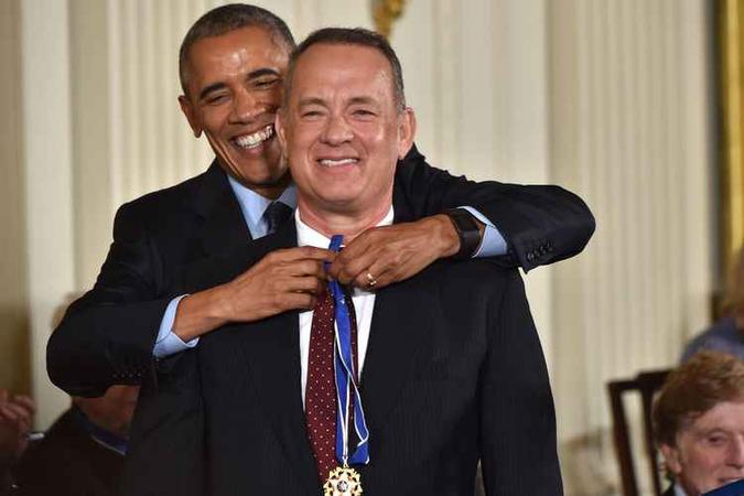 Tom Hanks também ganhou a Medalha da Liberdade(foto: AFP / Nicholas Kamm ) Tom Hanks também ganhou a Medalha da Liberdade(foto: AFP / Nicholas Kamm )