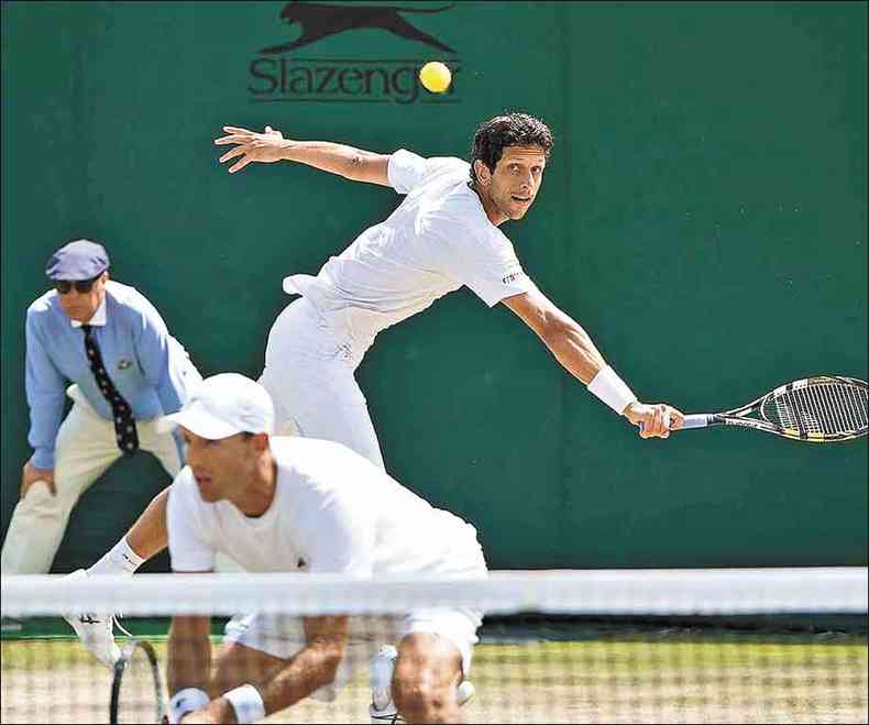 Marcelo Melo e Kubot derrotaram a dupla do brasileiro Marcelo Demoliner e agora enfrentaro franceses em Wimbledon(foto: WIMBLEDON/DIVULGAO )