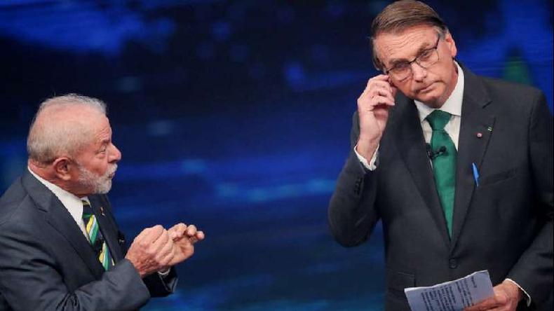 País dividido é reflexo dentro do núcleo familiar(foto: Reuters) Lula e Bolsonaro durante debate