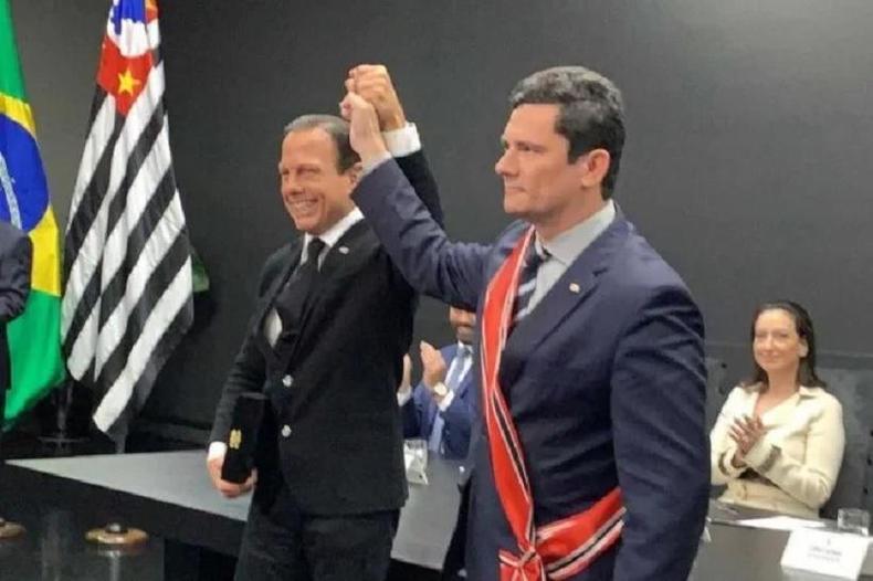 O governador de São Paulo, João Doria, e o ex-ministro da Justiça Sergio Moro(foto: Governo de São Paulo/Divulgação) João Doria e Sergio Moro de mãos dadas