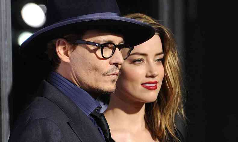 Atores Johnny Depp e Amber Heard em foto de 2014