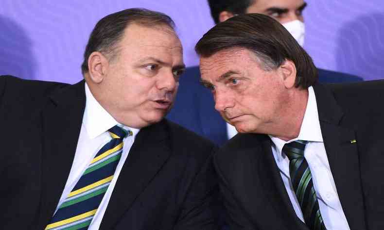 O ex-ministro da Sade, Eduardo Pazuello, e o presidente Jair Bolsonaro (foto: AFP / EVARISTO SA)