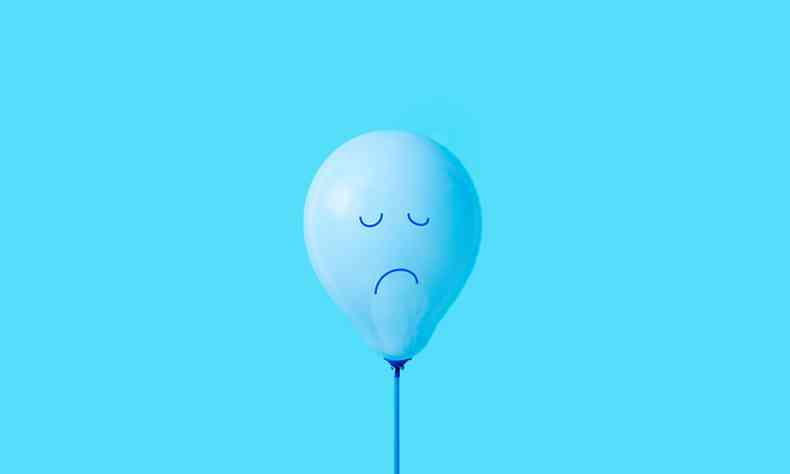 balão azul com cara de tristeza