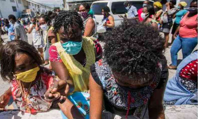 Mesmo antes da COVID-19, ONU j havia calculado que 40% dos haitianos precisariam de ajuda humanitria este ano(foto: PIERRE MICHEL JEAN/AFP)